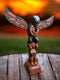Raven Sun Totem Pole