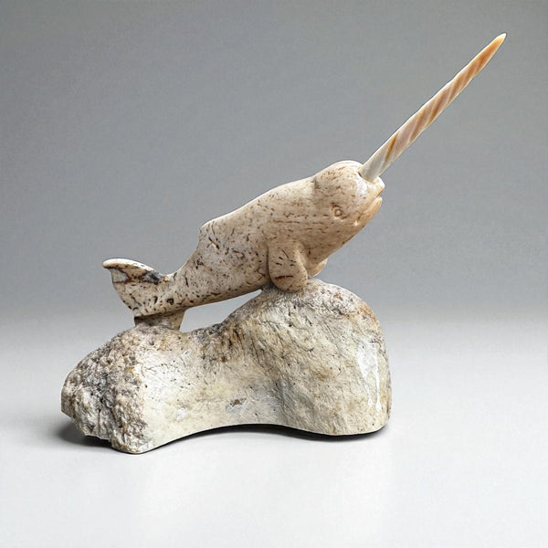 biloxi tribe crafts wood and stone fishing pole Alaska Fisherman Fossil Carving – Fish Creek Company