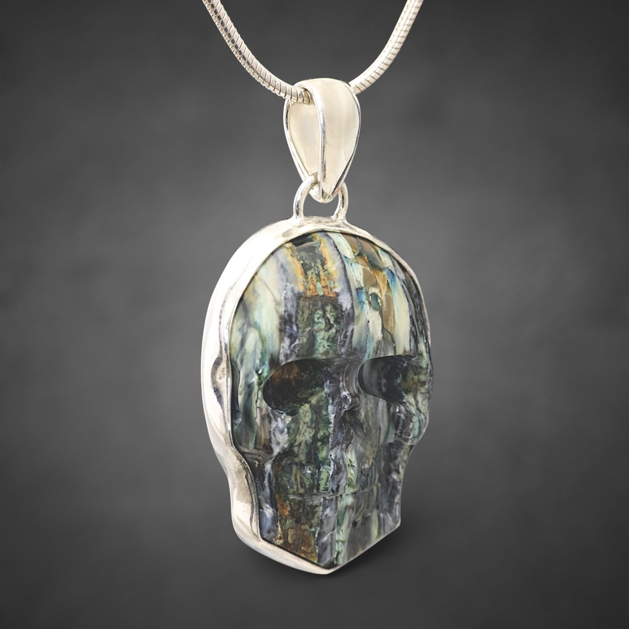 Mammoth Tooth Skull Pendant