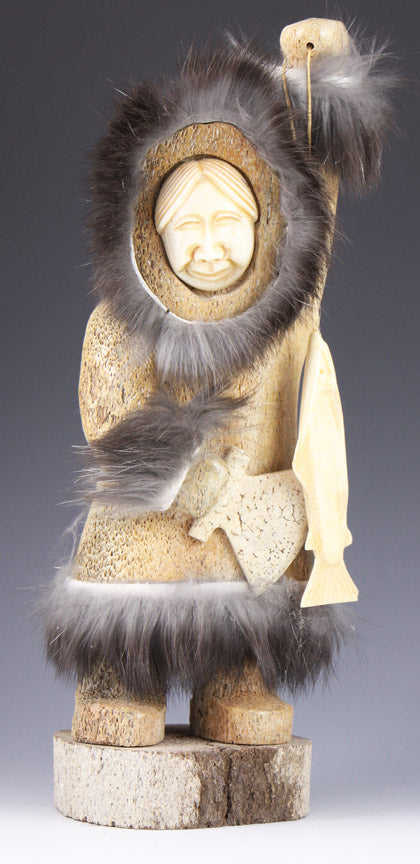 Eskimo Woman with Salmon and Ulu Knife