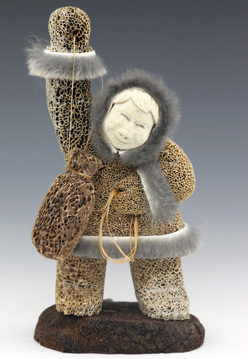 Eskimo with Hunting Float Carving